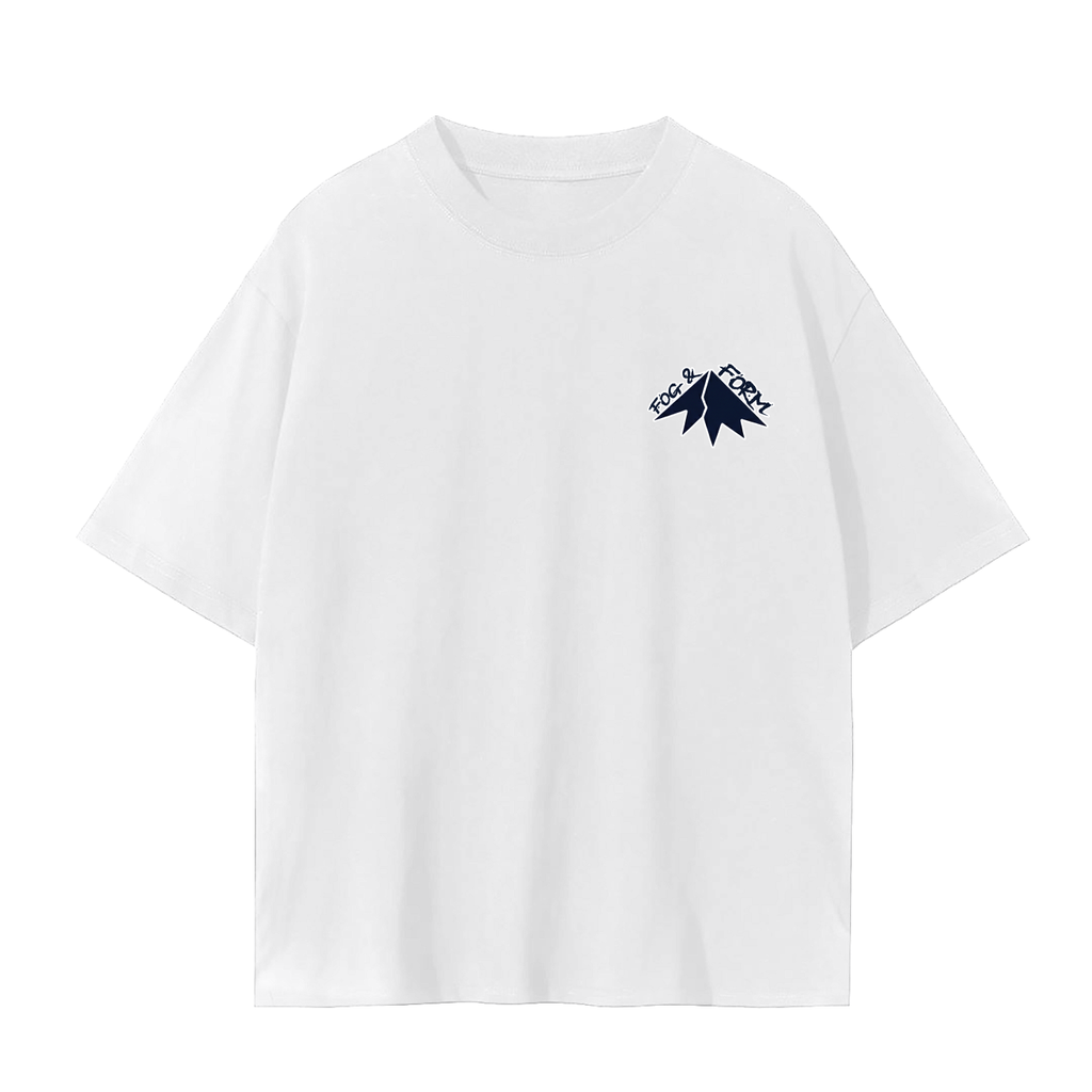 White t-shirt with a navy mountain top and Fog & Form.
