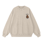 A light beige crewneck sweatshirt with a small graphic on the left chest showing an outdoor bear wearing a hat and the text 'Daddy?'.