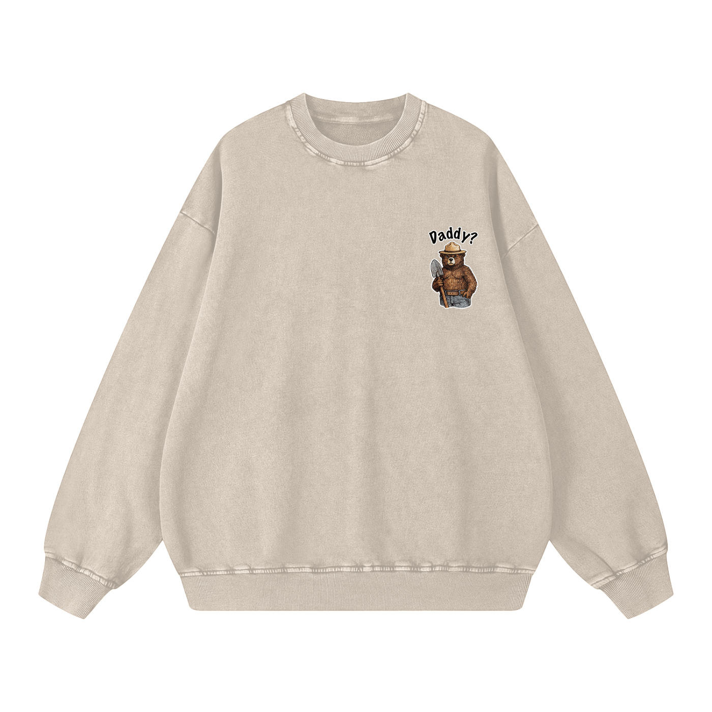 A light beige crewneck sweatshirt with a small graphic on the left chest showing an outdoor bear wearing a hat and the text 'Daddy?'.