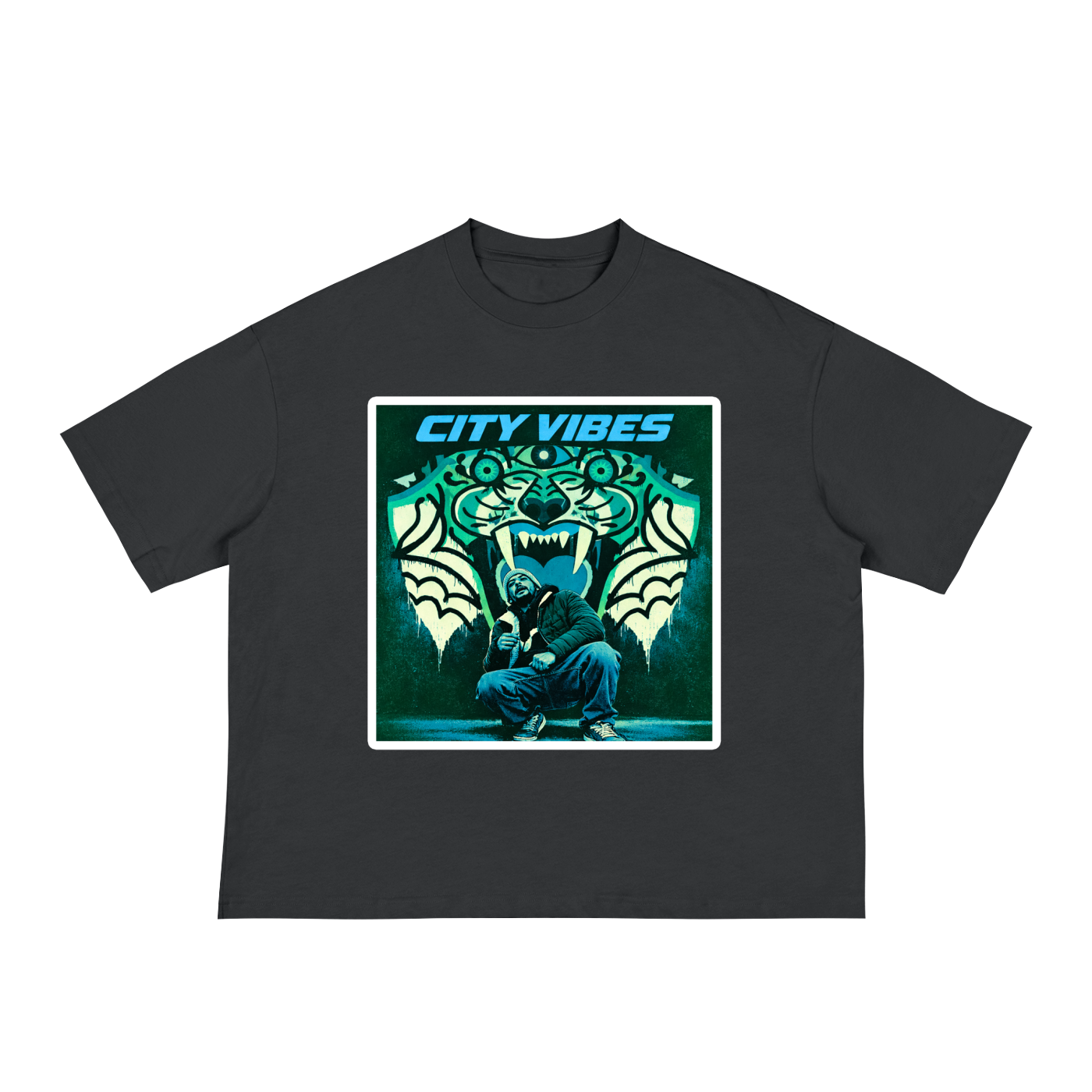 A dark gray short-sleeve boxy wide t-shirt with stylized picture of a person crouching in front of abstract mural of tiger head.