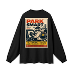 Black long-sleeve streetwear shirt with a graphic design on the back featuring park smart campaign.