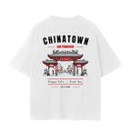 Back of white t-shirt depicting SF Chinatown Dragon Gate.