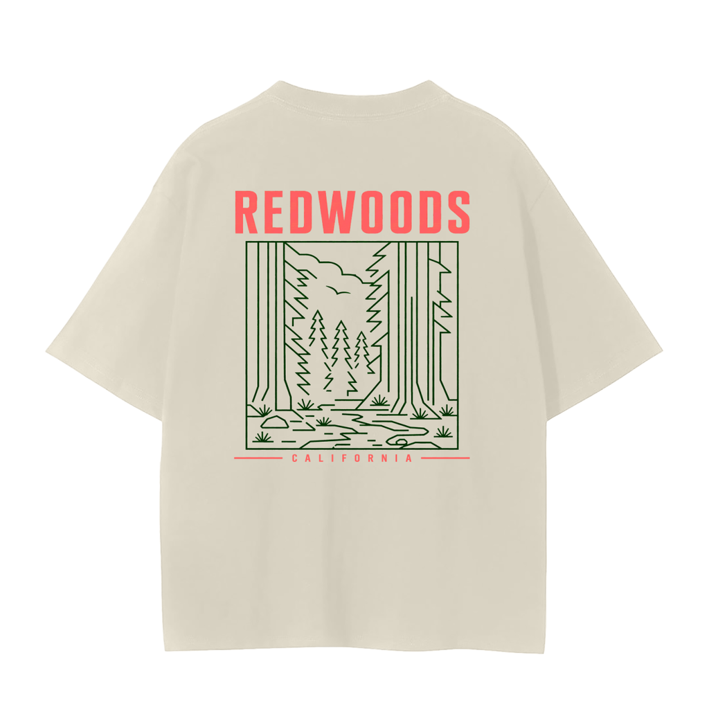 An oversized cream-colored t-shirt with a Redwoods trees on the back. 