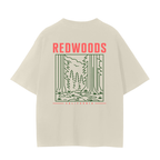 An oversized cream-colored t-shirt with a Redwoods trees on the back. 