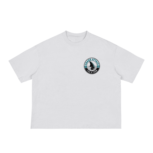 White t-shirt with a hockey chest icon for shark attack.