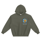 An grey green pullover hoodie featuring a circular graphic on the left chest with a cartoon dog in mural space theme. 