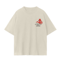A cream-colored short-sleeve t-shirt with a red and black Golden Gate Bridge graphic on the left chest.