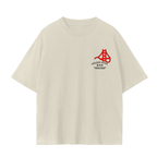 A cream-colored short-sleeve t-shirt with a red and black Golden Gate Bridge graphic on the left chest.