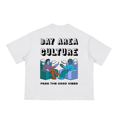 A white short sleeve t-shirt with a graphic print on the back, featuring the text Bay Area Culture, above an illustration of two cartoonish characters smoking,