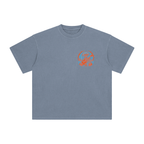 A washed blue crewneck t-shirt with abstract SF music hippie skeleton. 